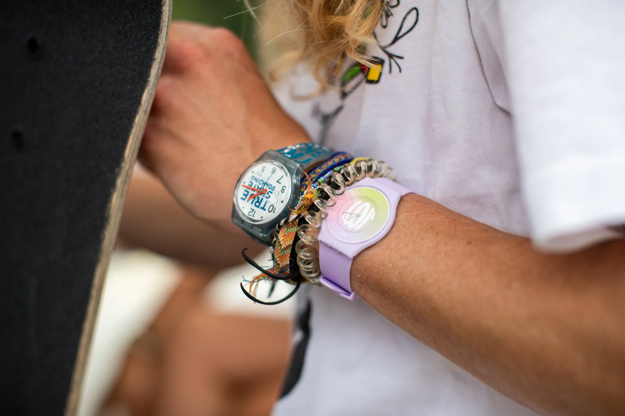 Portrait of pro skateboarder Andy Anderson wearing Swatch watch
