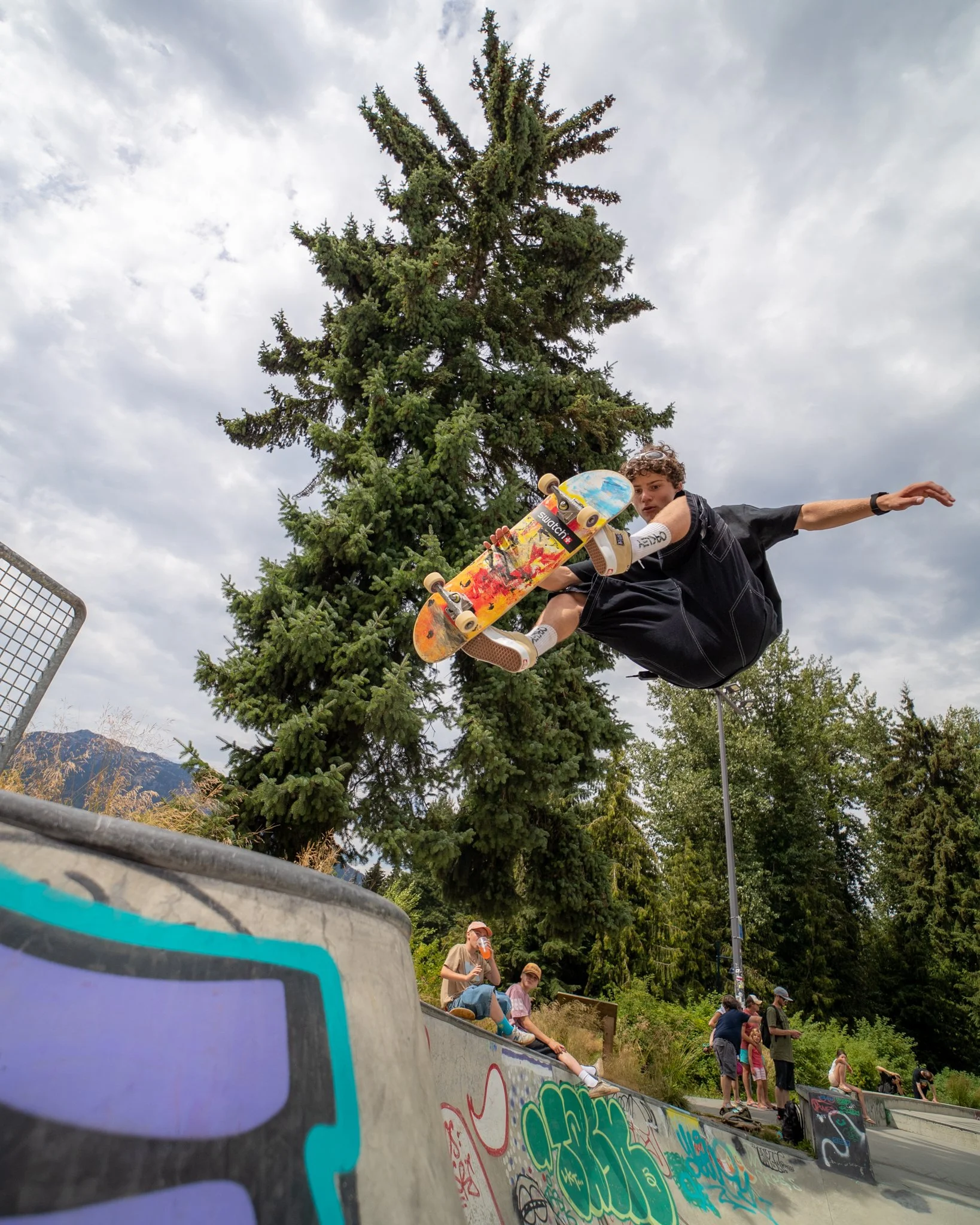 Andy Anderson dropping into halfpipe during golden hour shoot
