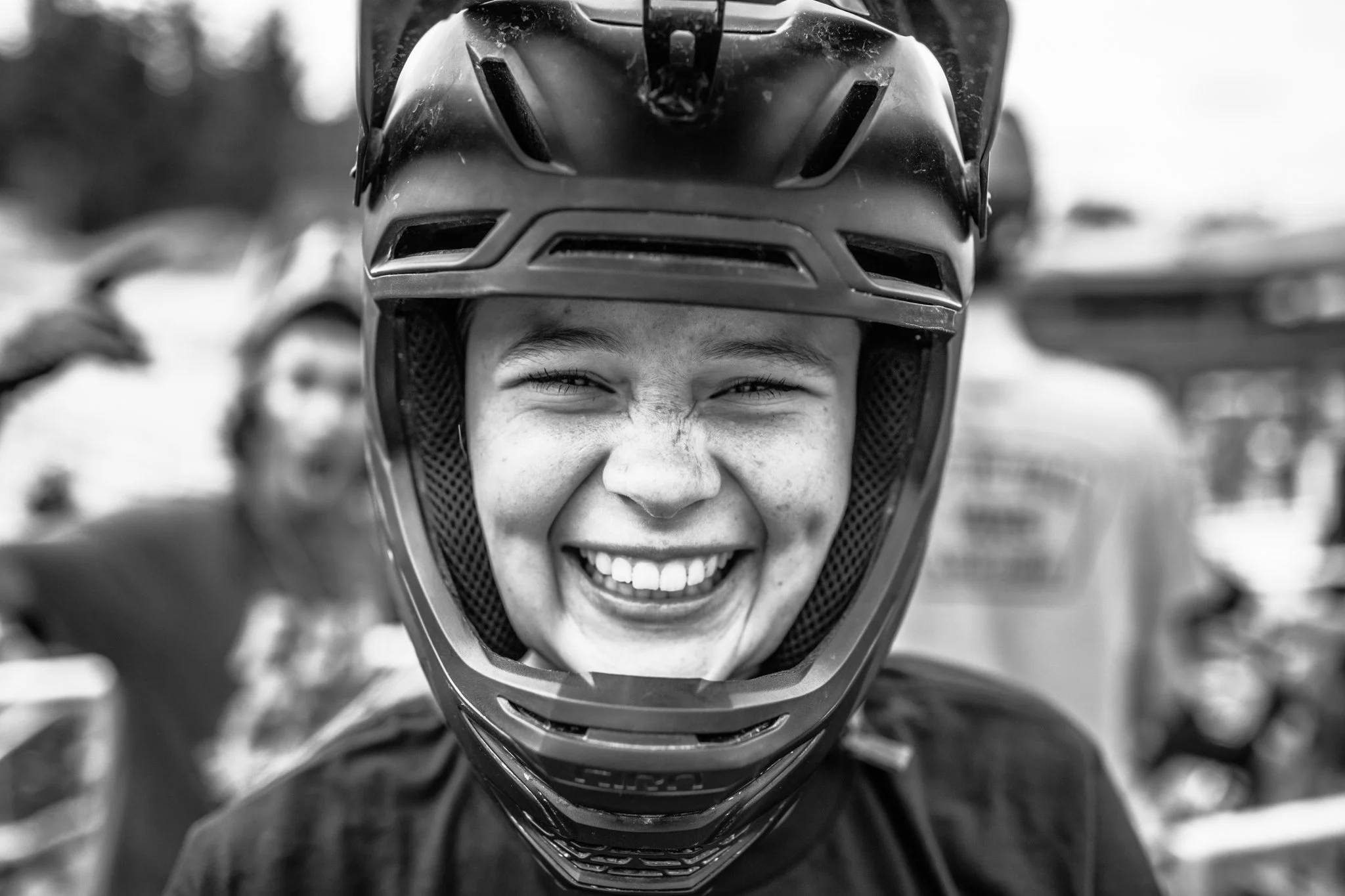 Casey Brown and Lucy Van Steenberg riding together on trail for Swatch
