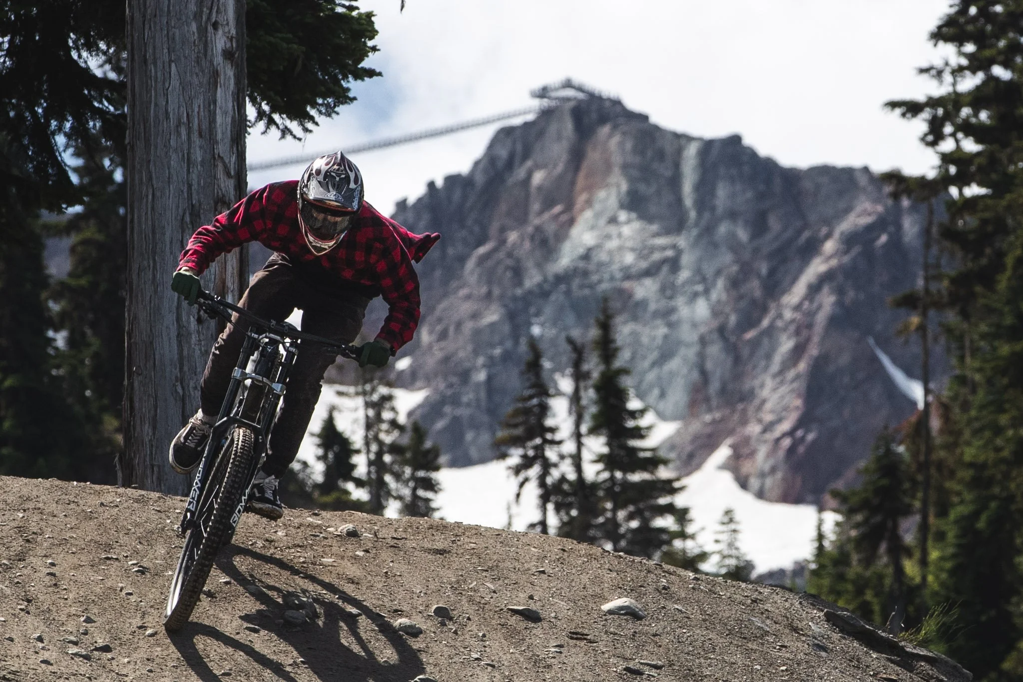 Mountain biker riding Whistler trails during Deep Summer photo challenge