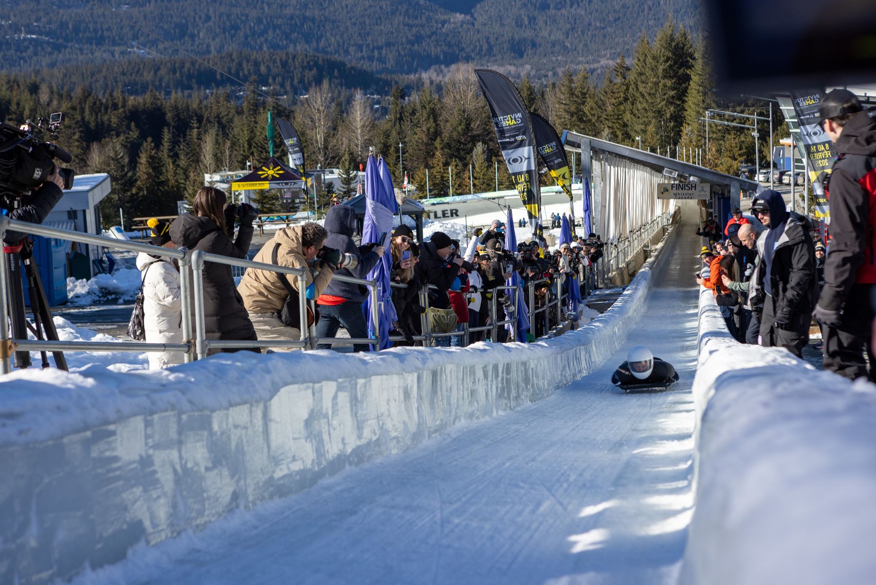 Skeleton athlete sliding down the Whistler Sliding Centre track