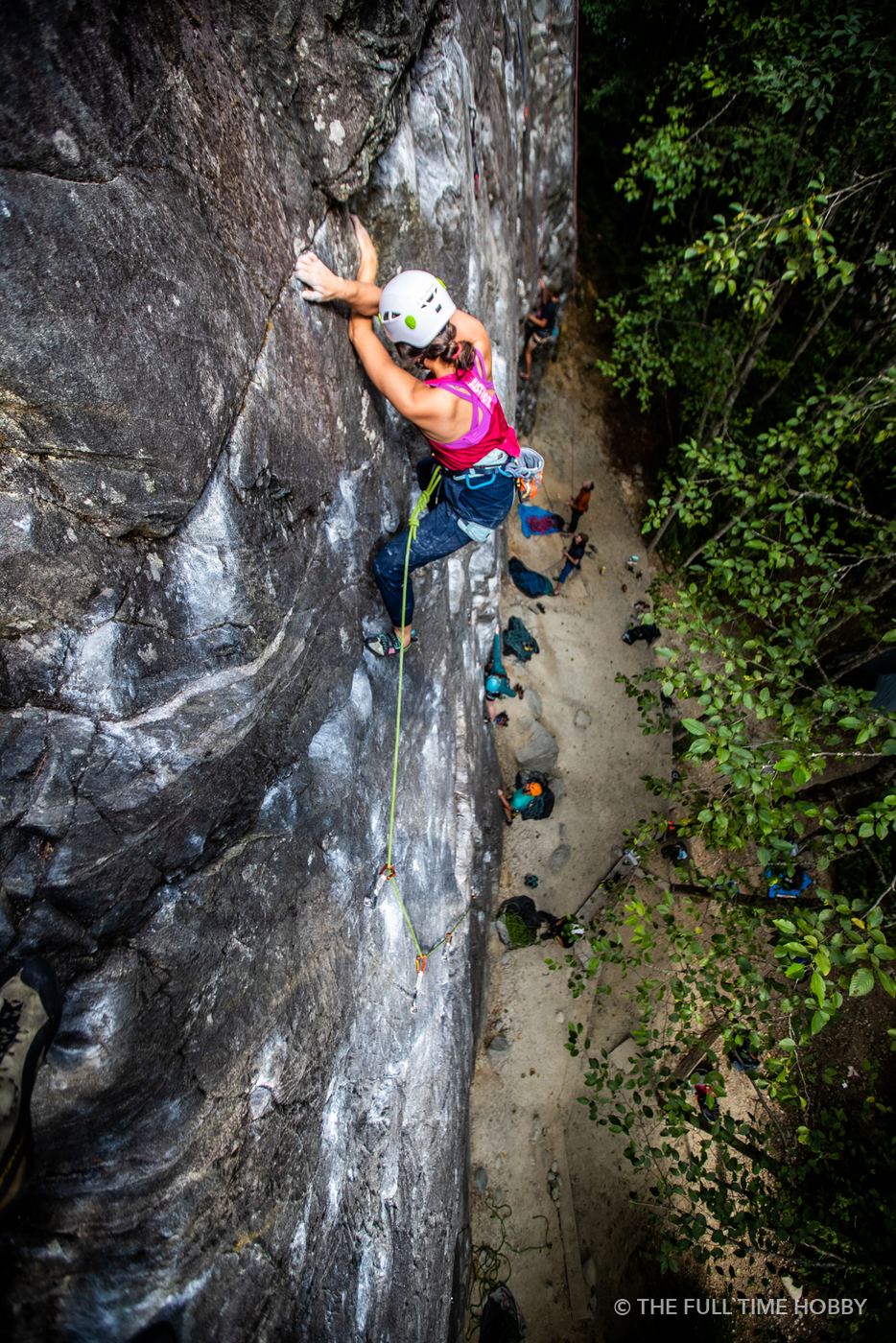 Climber in Pink on Wet Rock, Squamish, BC