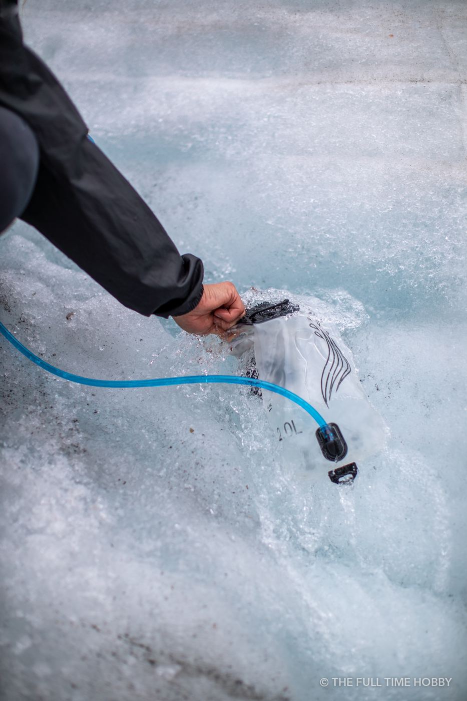 Filling the Bottle on the Glacier, Bugaboo Provincial Park, BC