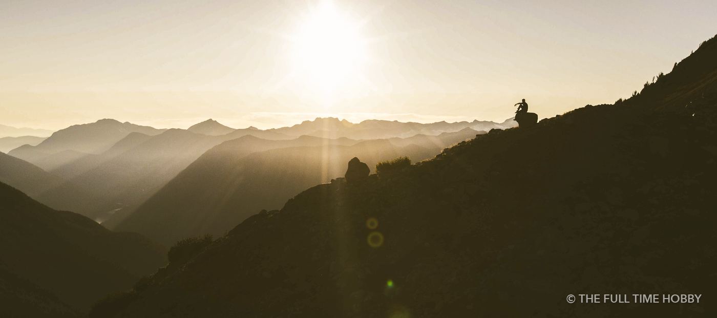 Hiker in Golden Haze, Jim Haberl Hut, Tantalus Range, BC