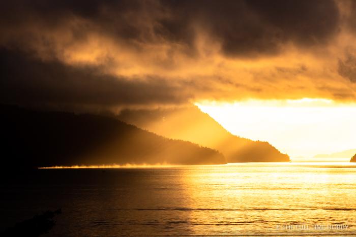 Golden Sunset Over the Coast &mdash; stock photo by Jeremy Allen