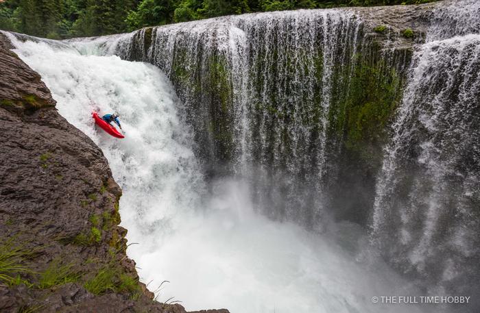 Kayaker Running a Wide Waterfall, Lower Lewis River Falls, Washington