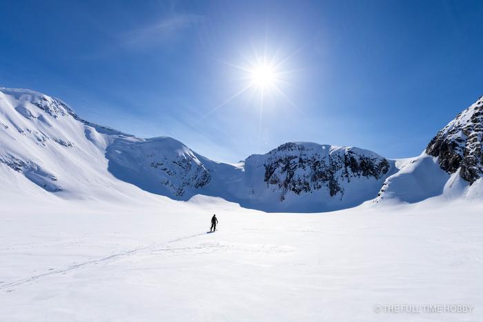 Lone Skier, Glacier Sunburst &mdash; stock photo by Jeremy Allen