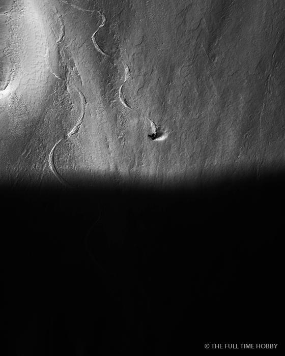 Lone Skier on a Shadowed Face, Alaska