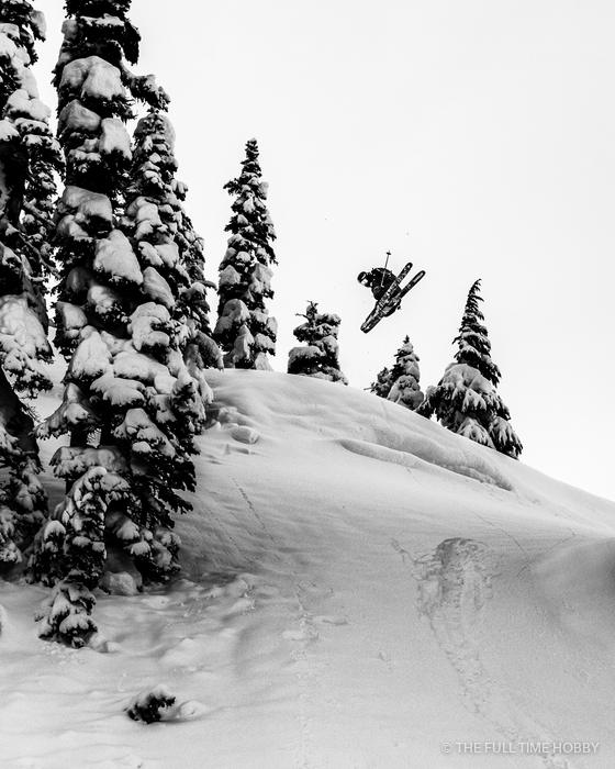 Skier Drop in the Trees, Whistler area, BC