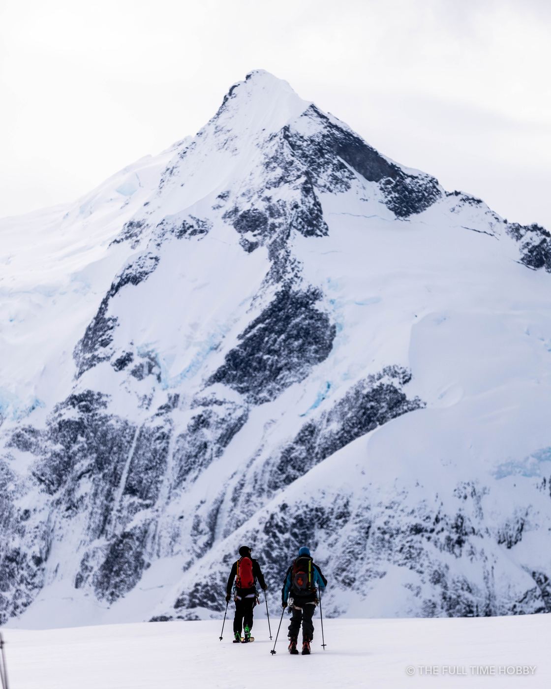 Climbers Below a Summit Pyramid, Alaska
