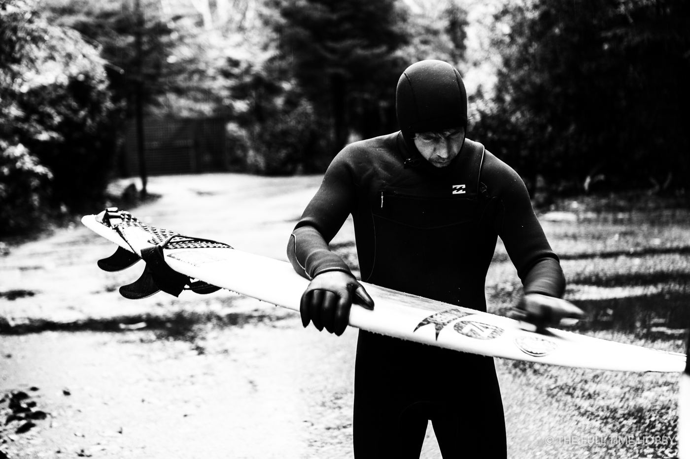 Surfer Waxing in the Snow, Tofino, BC